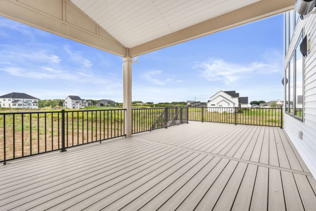Covered composite deck overlooking Grand Rapids neighborhood